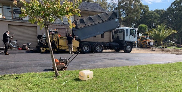 This is a photo of an asphalt driveway which is in the process of being installed by Maleny Asphalt & Bitumen Surfacing
